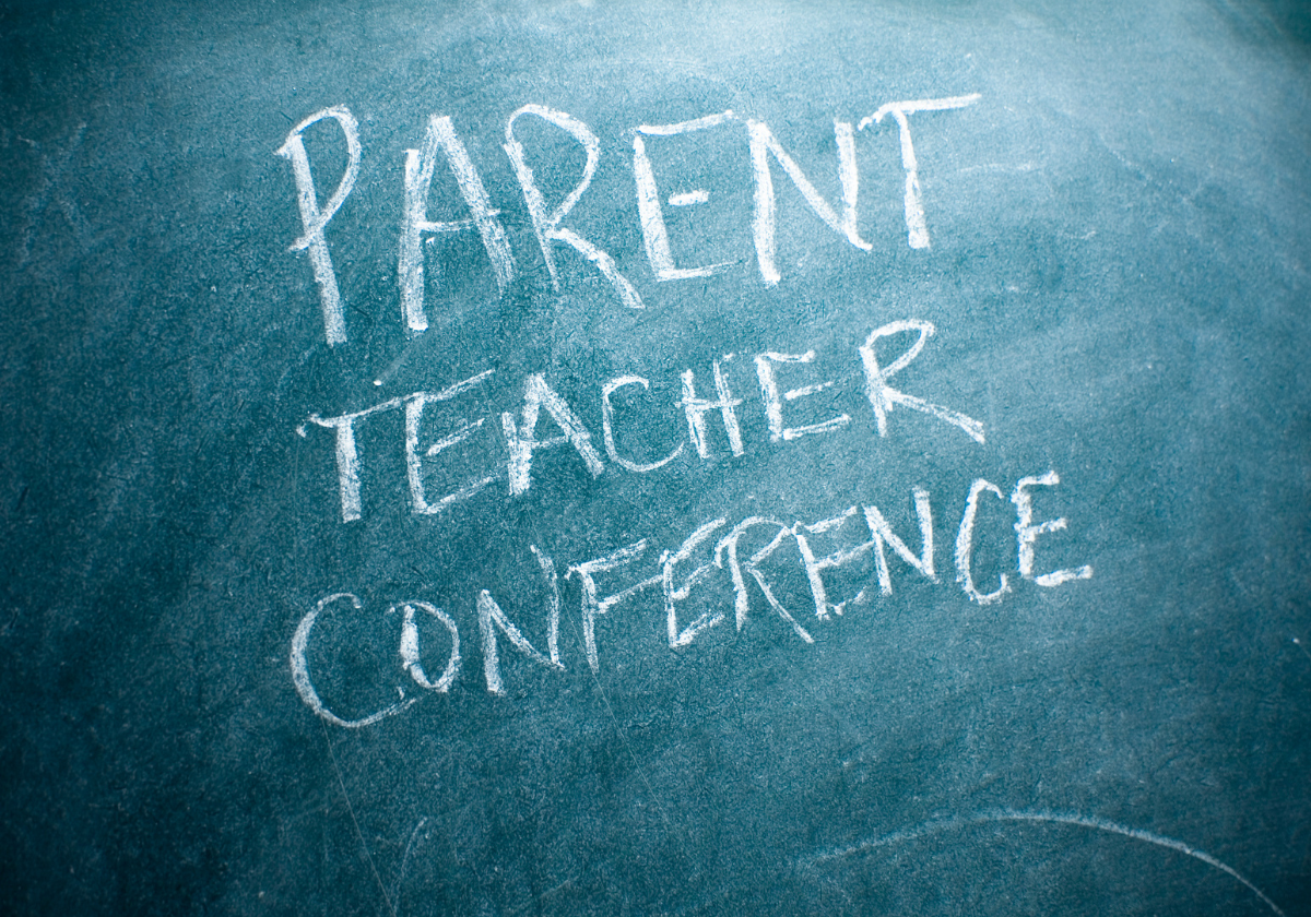 Parent-Teacher Conference written on chalkboard, highlighting the importance of maximizing parent-teacher conferences.