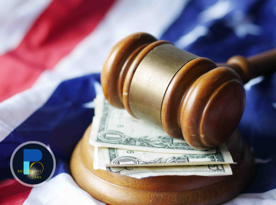 A judge's gavel resting on U.S. dollar bills atop an American flag, symbolizing federal funding in public schools and education policy decisions.
