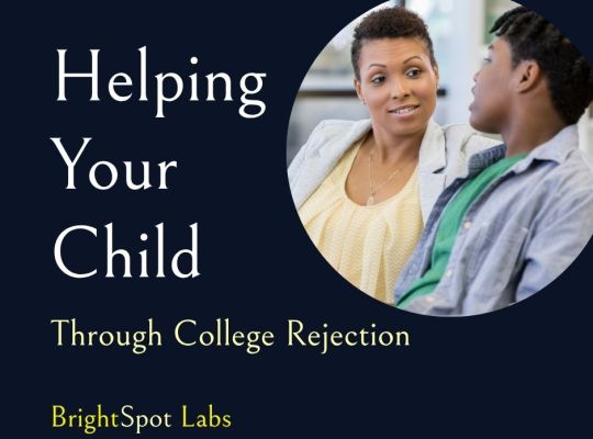 Parent comforting teenager at home after college rejection letter, showing empathy and support during the college admissions process