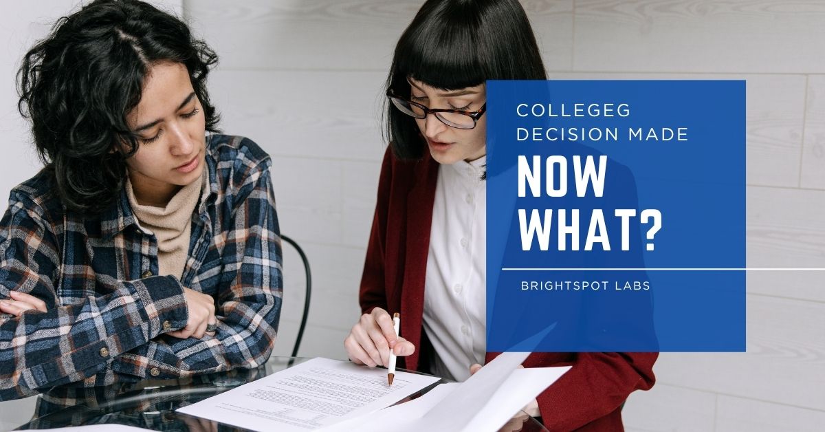 Parent and student reviewing what to do after the college decision